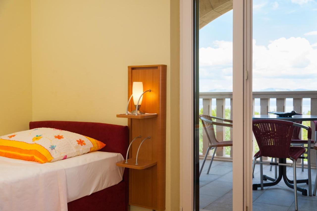 Apartments By The Sea Postira, Brac - 15242 Bagian luar foto
